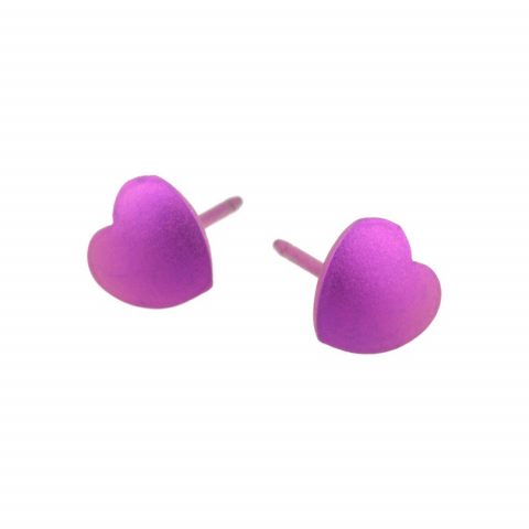 Pink love heart earrings made from hypoallergenic titanium.