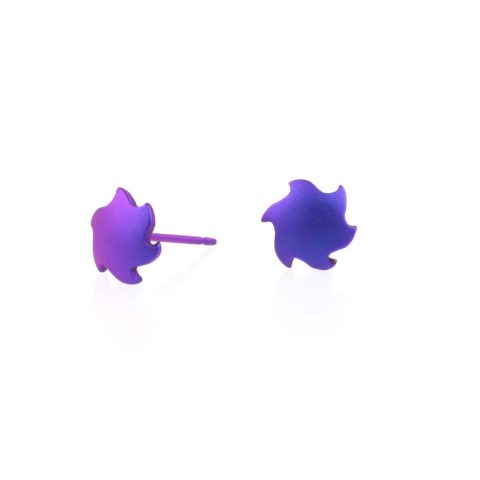 Purple titanium stud earrings shaped like a spinning sun.
